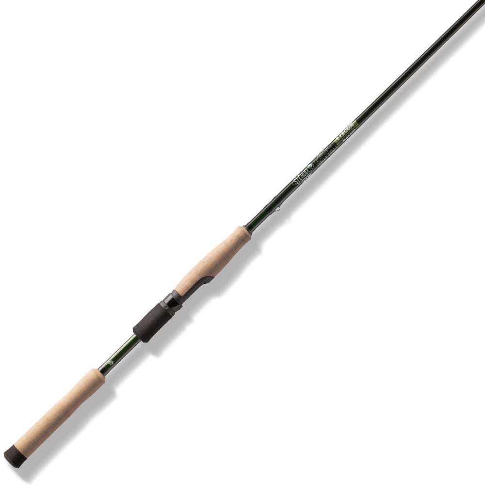 A St. Croix Eyecon Spinning Rod 6’3” Medium Vertical Jig (EYS63MXF) by St. Croix, featuring a green shaft, light brown cork handles, and a black reel seat, is photographed at a slight diagonal on a white background.
