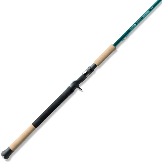 The St. Croix Mojo Inshore Casting Rod 7'6" Medium Heavy (JIC76MHF) features a green shaft, cork handle, black grip, and trigger reel seat—perfect for anglers seeking top saltwater performance.