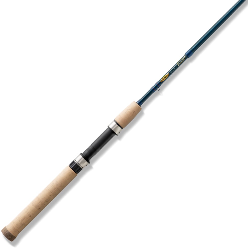 A close-up of the St. Croix Triumph Travel Spinning Rod 5'6” Ultra Light (TSR56ULF4) with a cork handle and blue shaft, displayed diagonally on a white background.