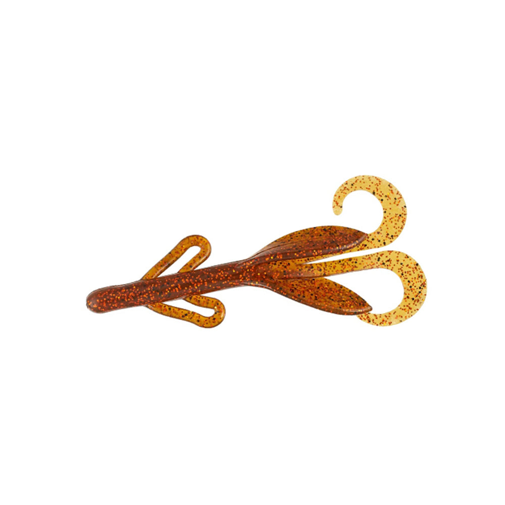 A brown and orange Zoom Brush Hogs creature bait by Zoom, with glitter flakes, two curly tails, and side appendages for attracting big bass, shown on a white background.