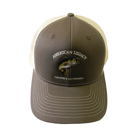 The American Legacy Fishing & Outdoors Bass Trucker Hat, in brown and white mesh, showcases an embroidered jumping fish and "American Legacy Fishing + Outdoors" text, blending bass-themed design with classic trucker style.