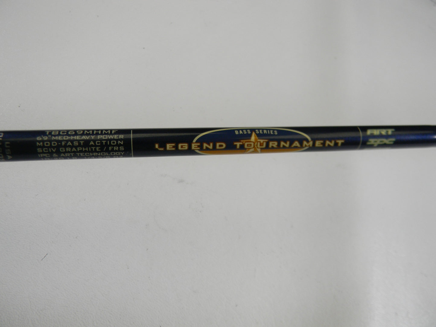 A close-up of a used St. Croix Legend Tournament Bass TBC69MHMF Sniper Spinnerbait 6'9" Medium Heavy Casting Rod—Good Condition, perfect if you're looking to trade in your gear for store credit with the Rod and Reel Trade-In Program.
