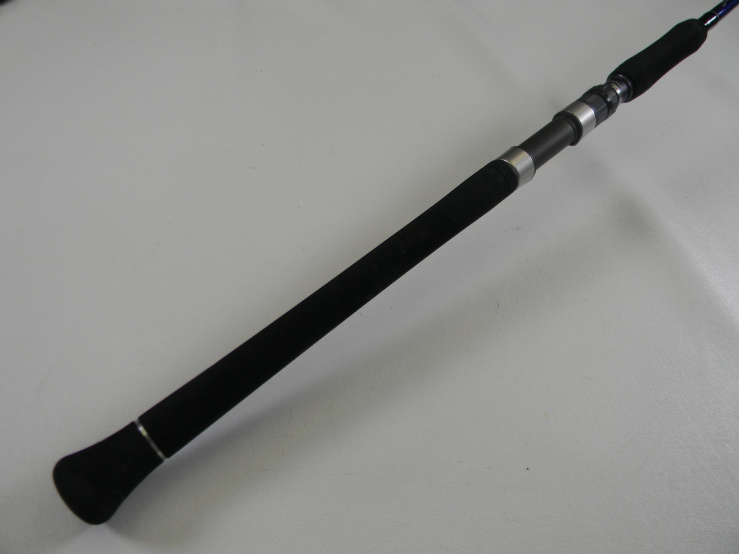A close-up of the Shimano Grappler Type C GRPCS70L 7'0" Light Used Spinning Rod in excellent condition—ideal for anglers looking to upgrade gear with our Rod and Reel Trade-In Program for store credit.