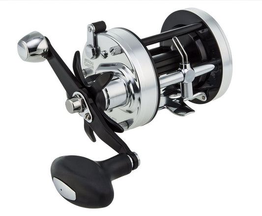 A close-up of the Abu Garcia 7000 C3 Reel 4.1:1 Casting Reel (C3-7000) in silver and black, featuring a large handle, detailed metal components, Carbon Matrix drag system, and modern design, isolated on a white background.
