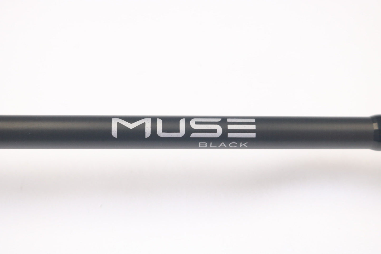 A close-up of the 13 Fishing Muse Black MBC71M 7'1" Medium Used Casting Rod in excellent condition, with "MUSE" and "BLACK" in white minimalist font. Ideal for anglers trading in through Rod and Reel Trade-In or earning store credit.