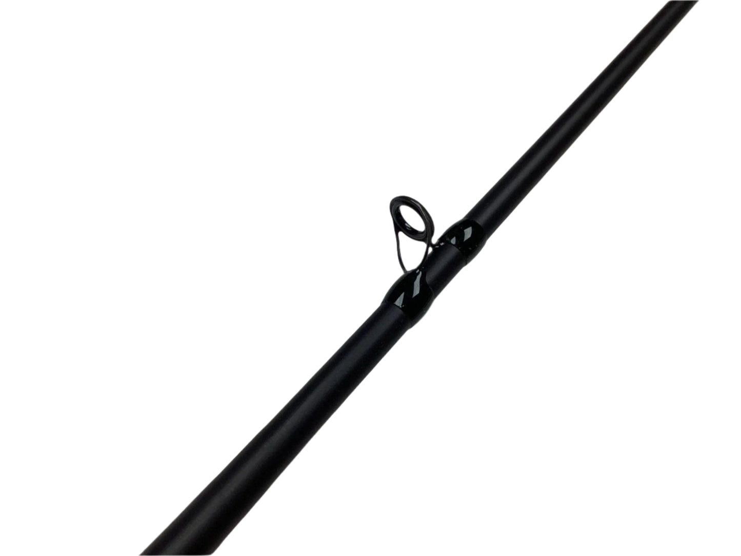 Close-up of a G. Loomis IMX-PRO Steelhead Casting Rod in mint condition on a light surface. The image highlights the glossy, circular line guide, ideal for those joining the Rod and Reel Trade-In Program to earn store credit.