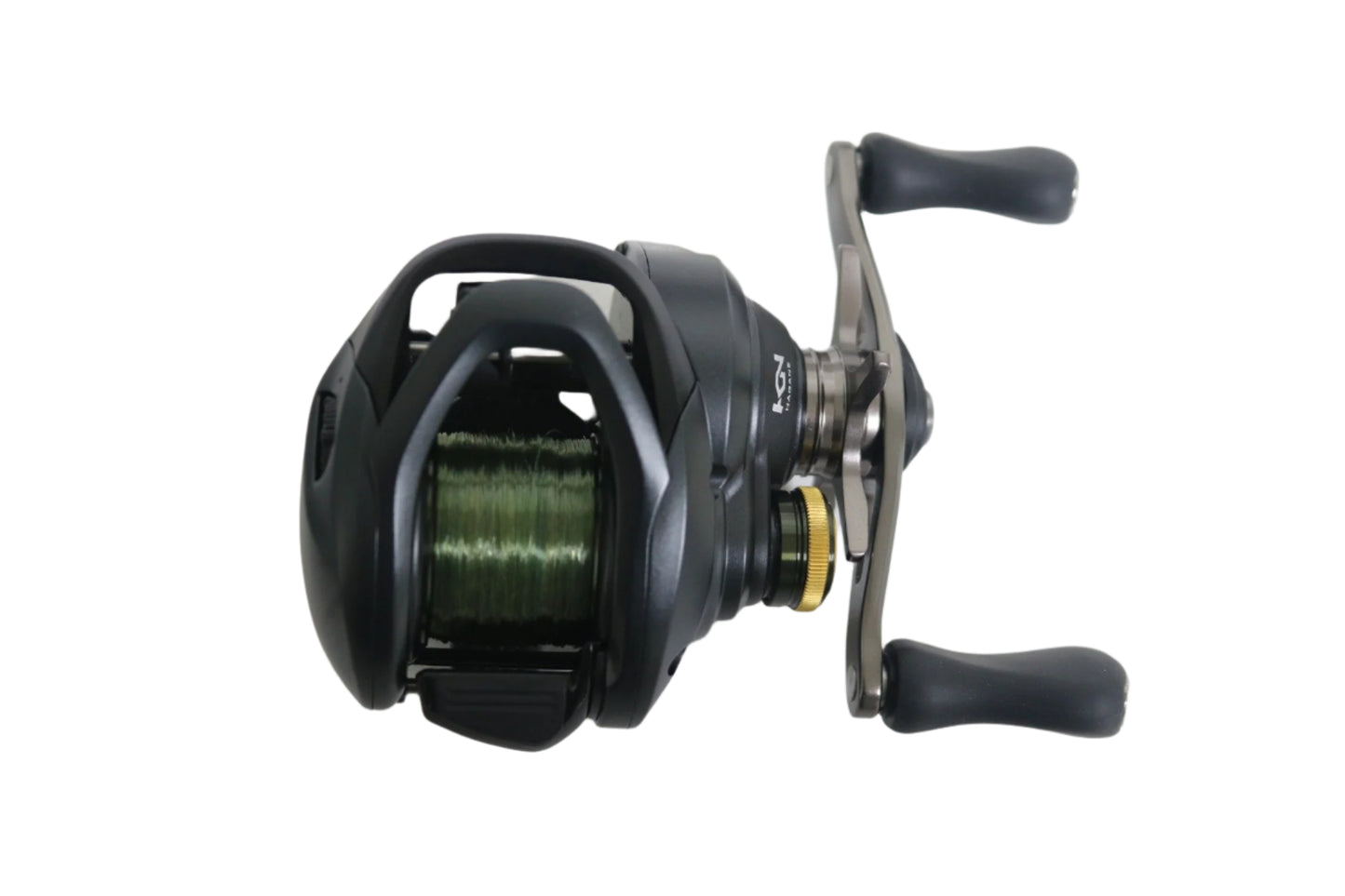 The Shimano Curado BFS CUBFSXGR 8.2:1 RH, a black casting reel with green line on a white backdrop, has double black-gripped handles and a metallic frame finish. Eligible for the rod and reel trade-in program, it's in excellent condition.