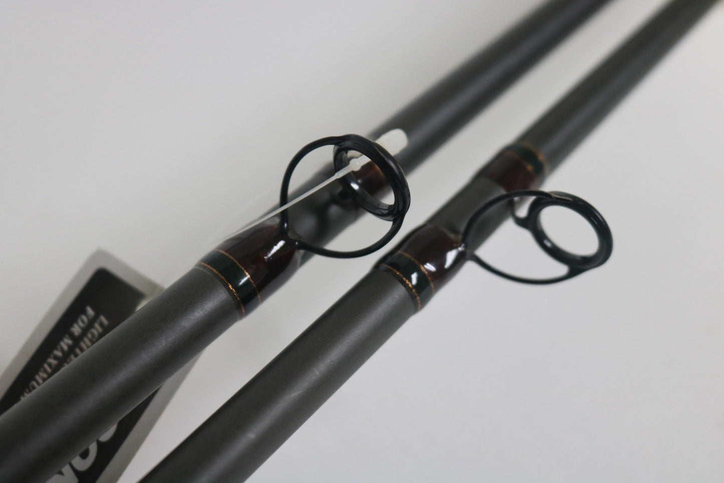 Two Fenwick Techna Av AVC79HF and AVC71HF casting rods, used and in very good condition, are shown side by side with close-up details of the guides—ideal for those shopping quality pre-owned Fenwick gear.