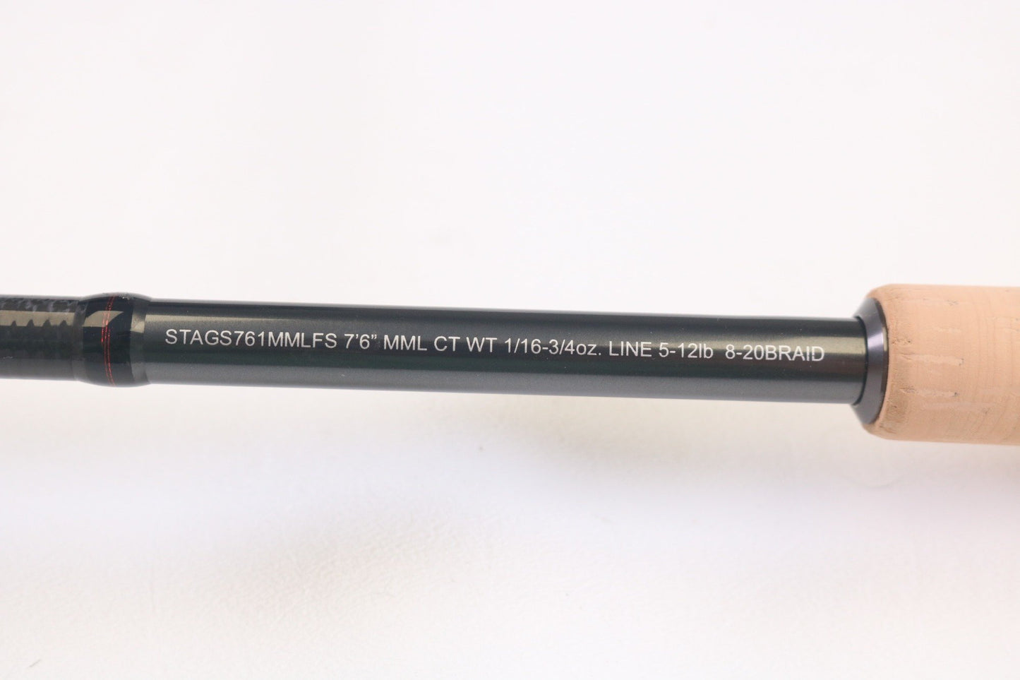 Close-up of Daiwa Steez AGS STAGS761MMLFS The One 7'6" Medium Medium Light used spinning rod in mint condition, with specs "CT WT 1/16-3/4oz. LINE 5-12lb 8-20BRAID"—ideal for quality fishing gear seekers or trade-in program.