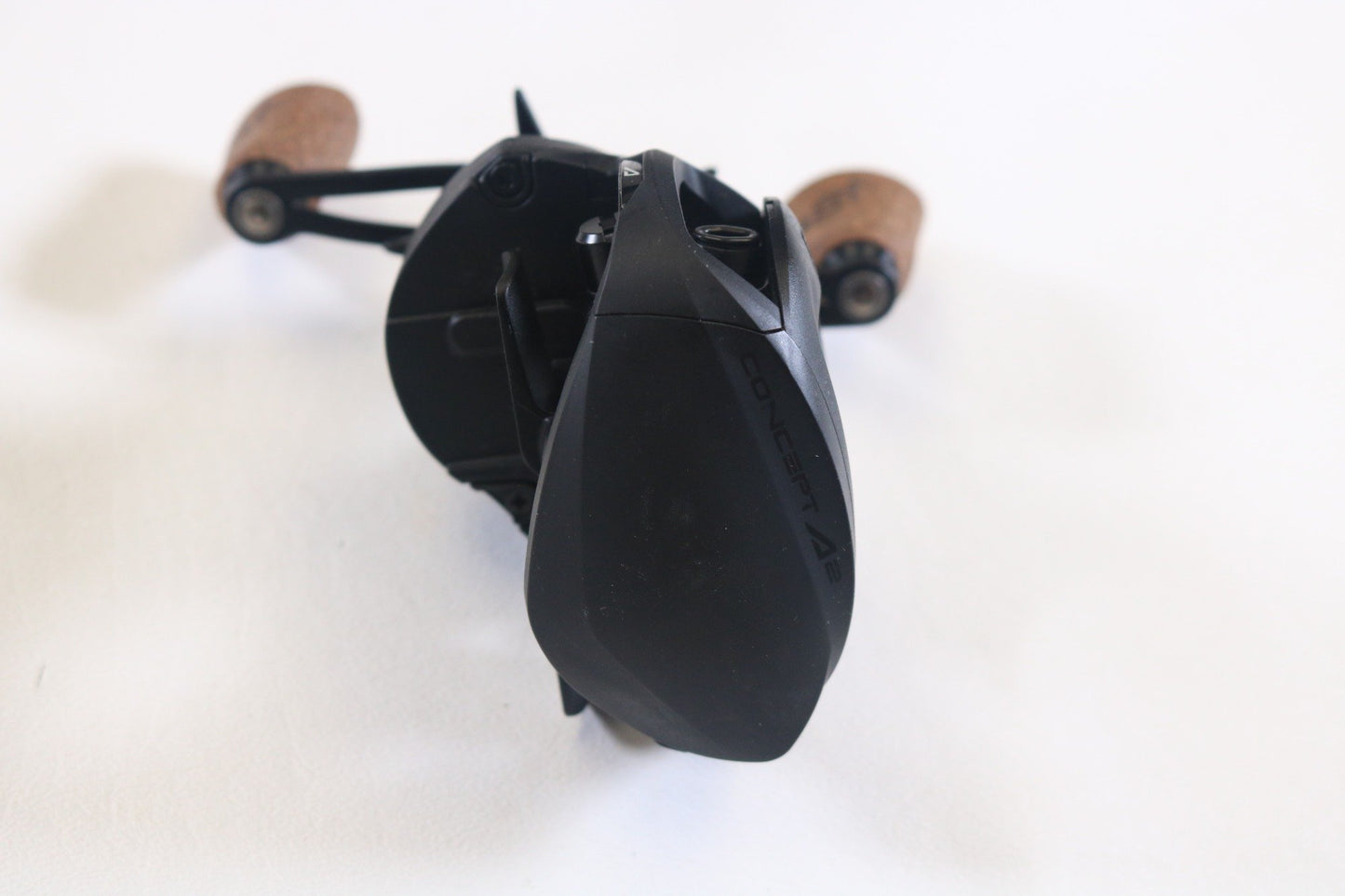 A 13 Fishing Concept A2 A2-7.5-RH 7.5:1 RH used casting reel in excellent condition is displayed on a white surface—ideal for those looking to earn store credit with our Rod and Reel Trade-In Program.