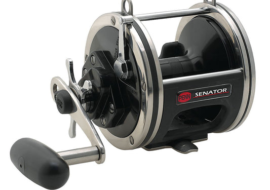 A close-up of the Penn Senator Star Drag Conventional Reel 115L2 highlights its durable black and silver design, sturdy handle, and branded Penn label—an essential offshore reel for dedicated anglers.