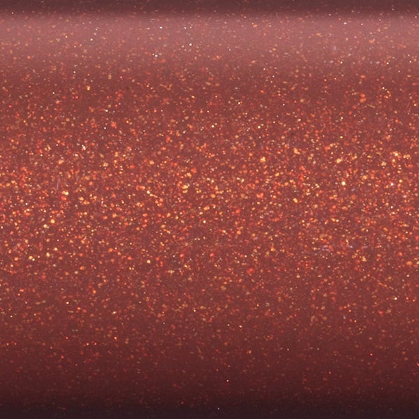 Close-up of a reddish-brown surface with gold and orange glitter, like the sparkling finish on the St. Croix Imperial USA 9'0" 8wt 2 Piece Fly Rod.