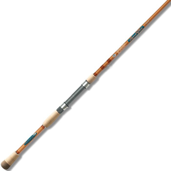 The St. Croix Legend Glass 7'2" Medium Spinning Rod (LGS72MM), featuring S-glass blanks, cork handle grips, and a metallic reel seat, is displayed diagonally on a white background.