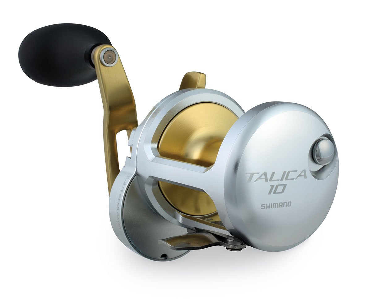 The Shimano Talica TAC10 Lever Drag Reel by Shimano features a silver and gold finish with a black handle, shown angled against a white background, and is known for its exceptionally smooth drag performance.