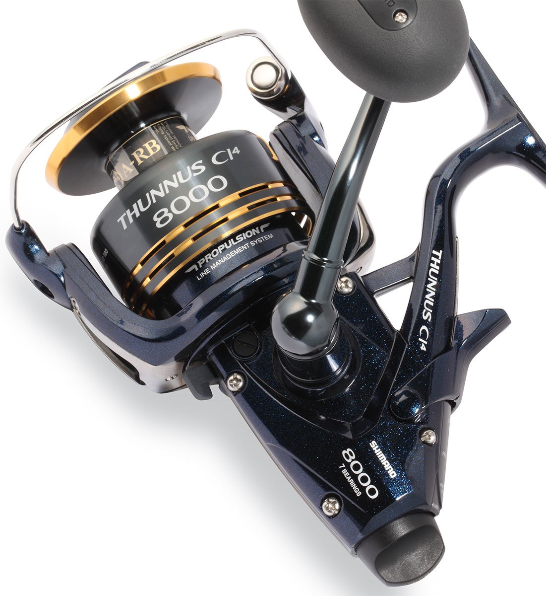 Close-up of the Shimano Thunnus 8000CI4 Saltwater Spinning Reel by Shimano, showcasing its lightweight design, spool, handle, and distinctive brand markings on a blue and gold metallic finish.