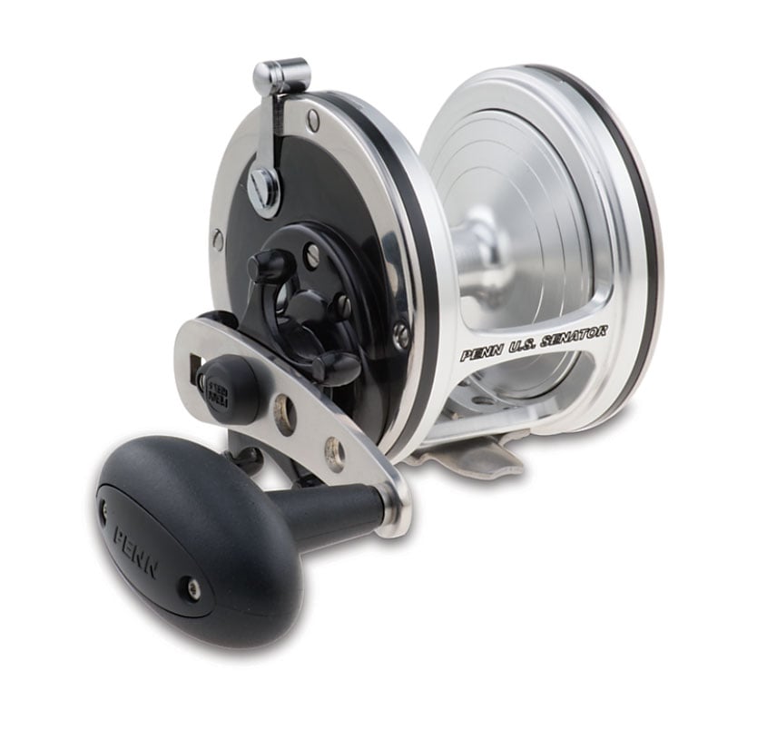 A silver and black Penn US Senator Conventional Fishing Reel US113 with a large handle is displayed on a white background, reminiscent of classic Penn models made in the USA.