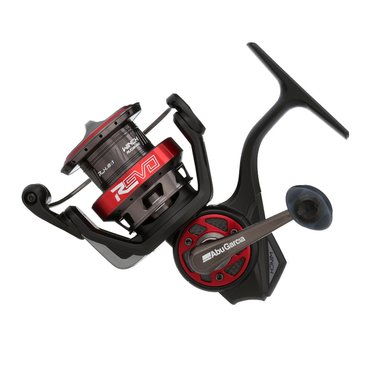 Red and black Abu Garcia spinning fishing reel on a white background, featuring a modern design with visible logo and model details.