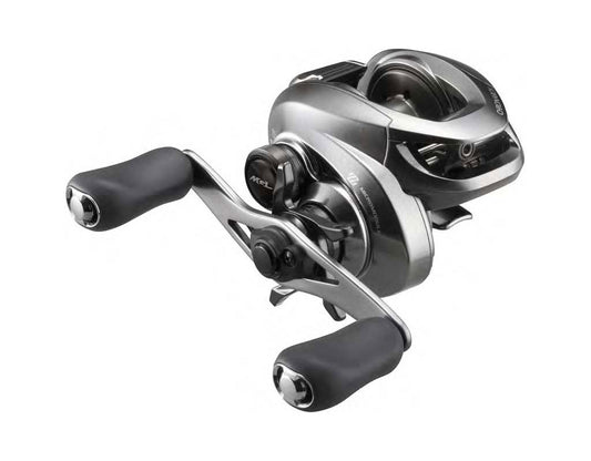 A close-up of the Shimano Chronarch MGL CHMGL151XG 8.1:1 Left Hand Casting Reel by Shimano, featuring a silver metallic frame, two black rubberized handles, and modern MicroModule gearing, shown on a white background.