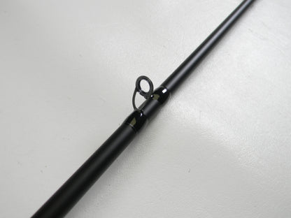 A close-up of the Dobyns Champion XP DC705C 7'0" Mag Heavy Used Casting Rod in excellent condition showcases its black finish and line guide, ideal for highlighting trade-in eligible gear for store credit.