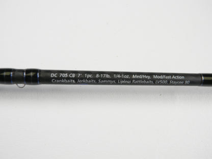 Close-up of a Dobyns Champion XP DC705CB 7'0" Med Hvy Used Casting Rod in excellent condition. Specs: 8-17lb, 1/4-1oz, Mod/Fast action. Great for crankbaits and jerkbaits. Trade in your used rod for store credit!.