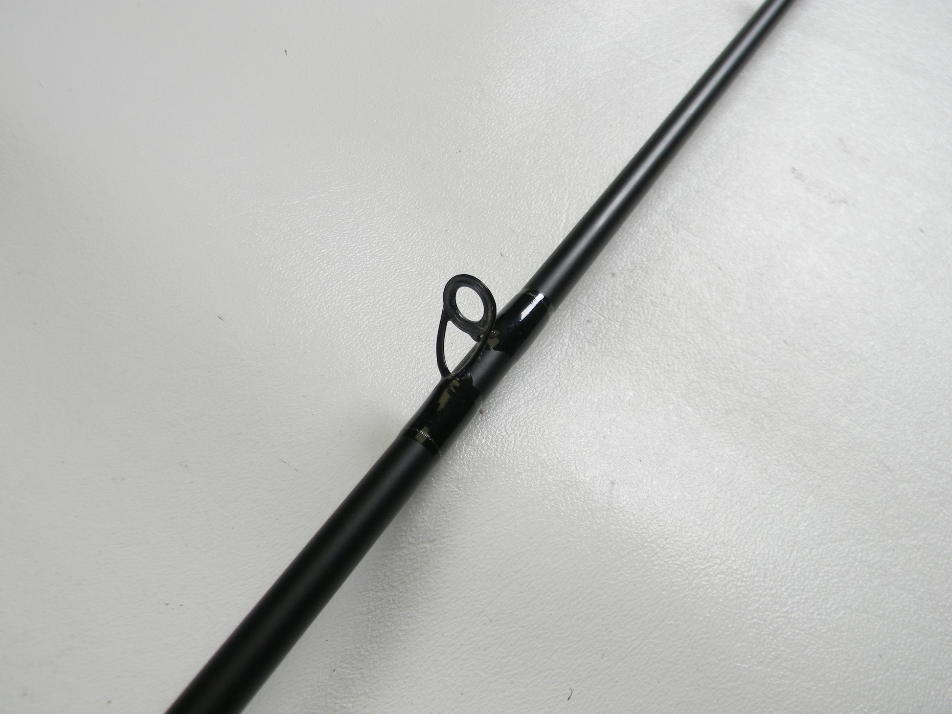 A close-up of a Dobyns Champion XP DC706CB 7'0" Heavy casting rod in excellent used condition, ideal for those trading in gear for store credit through our Rod and Reel Trade-In program.