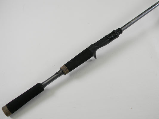 The St. Croix Black Bass RIC73MHF 7'3" Medium Heavy Used Casting Rod, in excellent condition, features a foam grip handle and trigger-style reel seat—ideal for our Rod and Reel Trade-In Program.