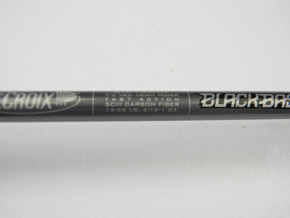 Close-up of a St. Croix Black Bass RIC73MHF 7'3" Medium Heavy Used Casting Rod—fast action, SCIII carbon fiber, 14-65 lb, 5/16-1 oz, excellent condition. Part of our Rod and Reel Trade-In Program for quality used gear seekers.