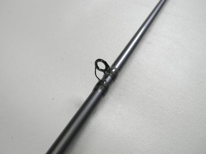 A close-up of the St. Croix Black Bass RIC73MHF 7'3" Medium Heavy Used Casting Rod in excellent condition, featuring a single line guide against a plain background, perfect for the Rod and Reel Trade-In Program and store credit offers.