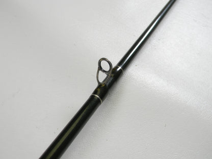 Close-up of a St. Croix Legend Elite EC68MHF 6'8" Medium Heavy used casting rod in very good condition, highlighting a metal line guide against a white background—ideal for those looking to upgrade with our Rod and Reel Trade-In Program.