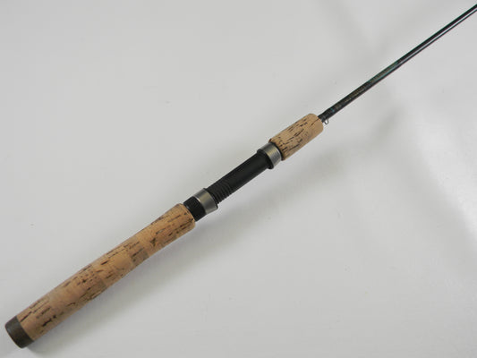 A close-up of the St. Croix Premier PS60LF 6'0" Light used spinning rod in good condition, featuring a cork handle and metal reel seat—ideal for our Rod and Reel Trade-In Program if you’re ready to upgrade your used gear.