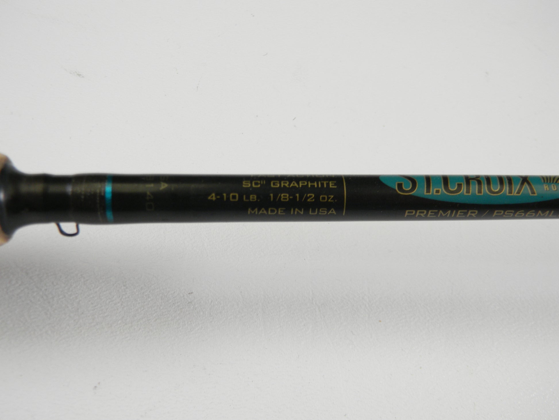 A close-up of the St. Croix Premier PS66MLF 6'6" Medium Light Spinning Rod (used, good condition) makes it an ideal candidate for our Rod and Reel Trade-In Program if you're considering upgrading your fishing gear.