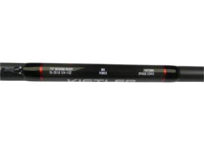 A close-up of the black handle on the Kistler Feel n Reel FNR70MH 7'0" Medium Heavy casting rod shows its specs. Part of our Nation's Best Rod and Reel Trade-In Program, this used gear offers store credit options.