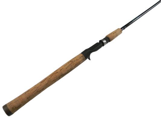 Close-up of a St. Croix Premier PC66MF 6'6" Medium used casting rod on white, boasting a cork handle and black reel seat. Ideal for upgrading through the Rod and Reel Trade-In Program to earn valuable store credit.