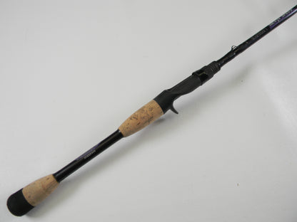 The St. Croix Mojo Bass MJC68MF Jerkbait 6'8" Medium casting rod, in very good condition, features a black design with a cork handle and trigger grip reel seat for right-handers. Ideal for casting, this rod can be paired with our store credit options for your next upgrade.