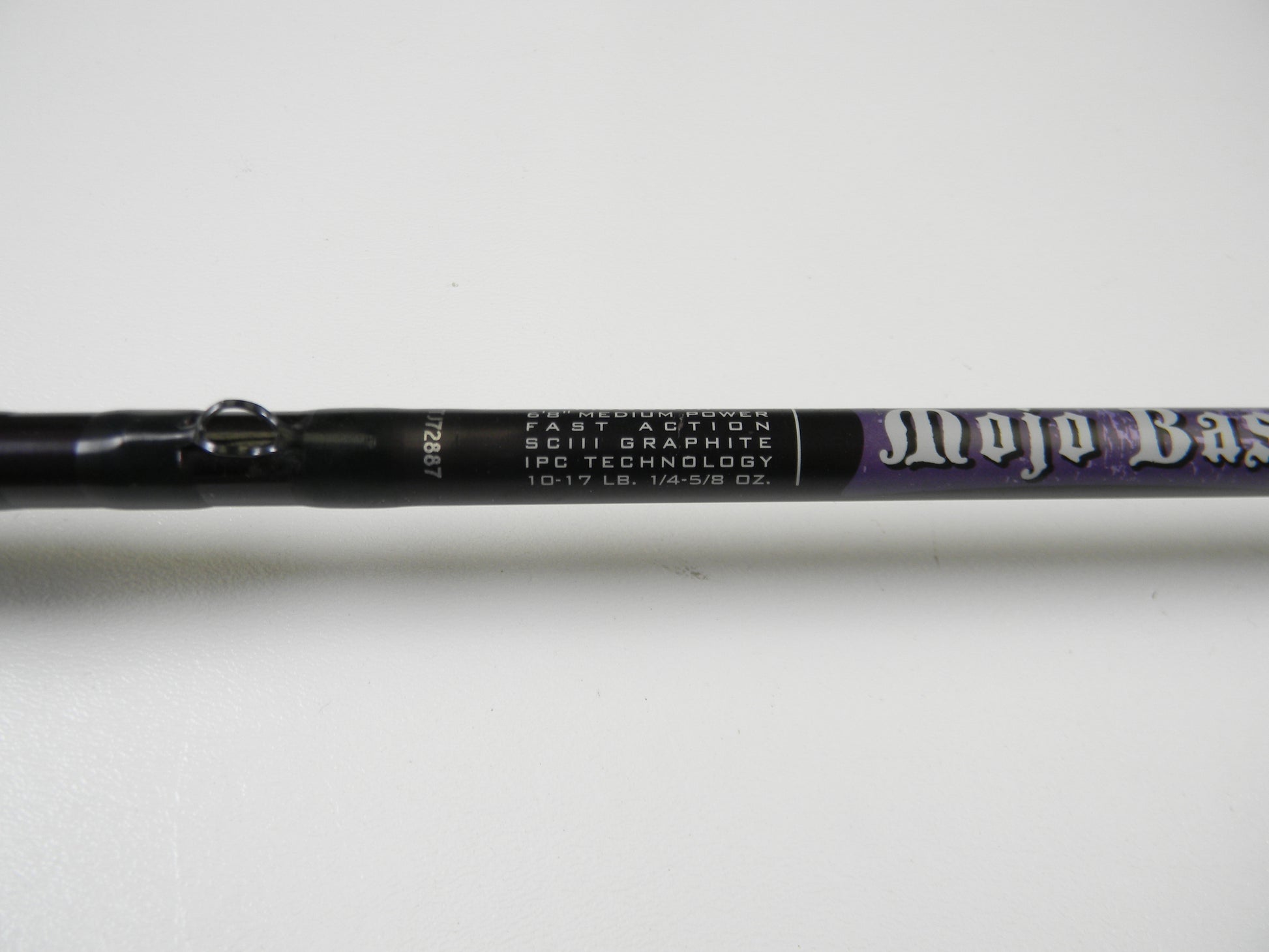 Close-up of a St. Croix Mojo Bass MJC68MF Jerkbait rod shows "Fast Action SCIII Graphite," "IPC Technology," and weight specs "10-17 LB. 1/4-5/8 OZ." The handle is partially visible, making it ideal for trade-in or store credit opportunities.