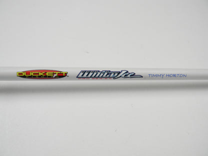Close-up of a white Duckett casting rod with "White Ice Pro Series" and "Timmy Horton" in blue, displayed on a plain white surface, ideal for showcasing or trading through our Rod and Reel Trade-In Program to earn store credit.