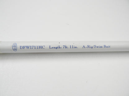 A close-up of the 7'11" Duckett White Ice DFWI711HC Byron Velvick rod, ideal for A-Rig/Swimbait. The "00715" indicates it's used. Trade it in through the Nation's Best Rod and Reel Trade-In Program for store credit.
