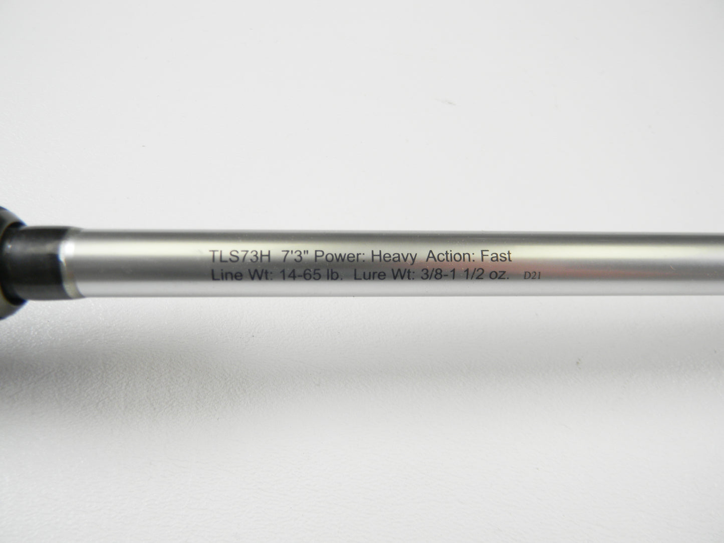 A close-up of Lew's Signature Series TLS73H Frog 7'3" Heavy, featuring specs: Power: Heavy, Action: Fast, Line Weight: 14-65 lb., Lure Weight: 3/8-1 1/2 oz. Against a white background, it's an ideal choice for exploring used gear conditions during rod and reel trade-in events.
