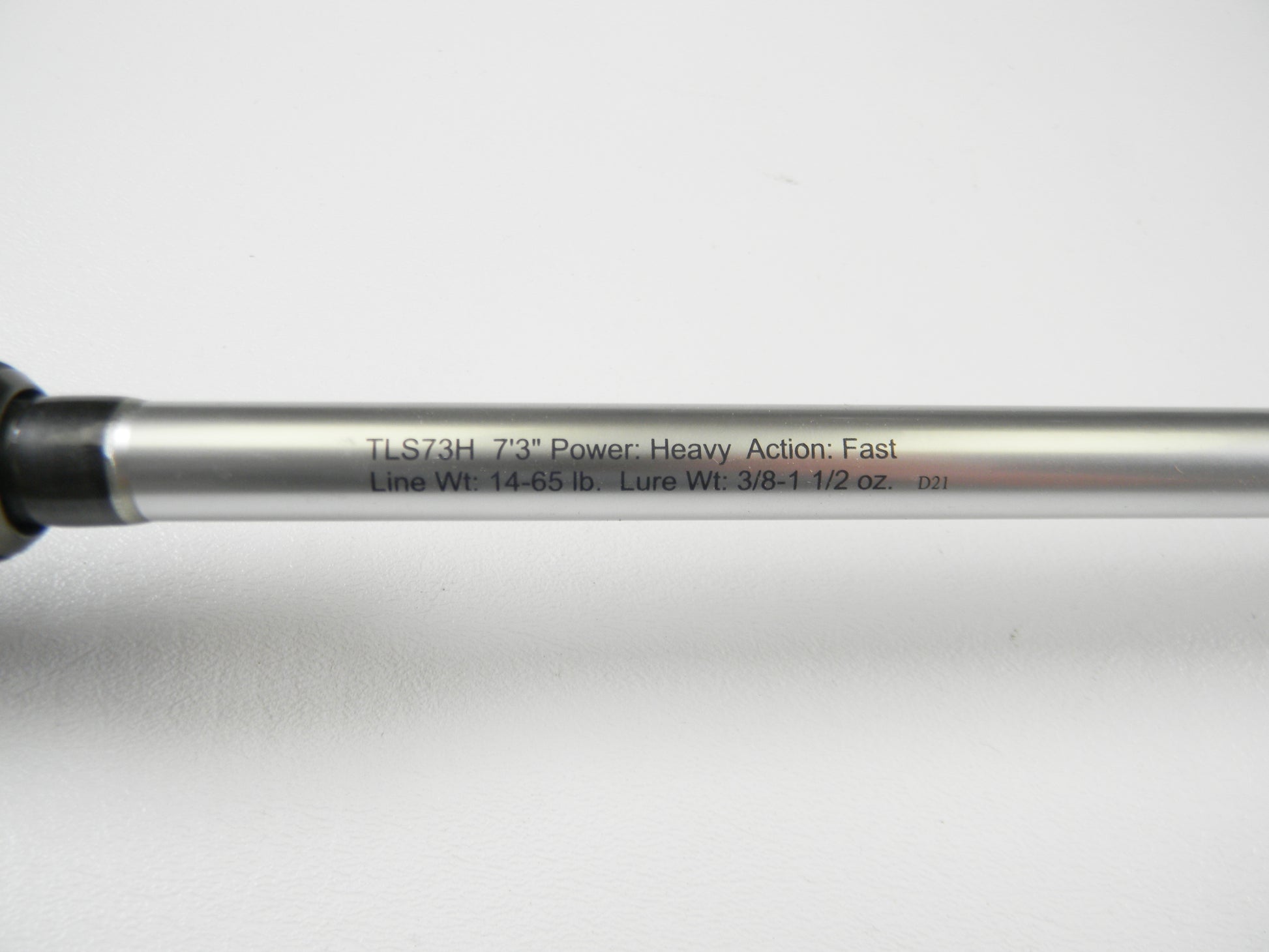 A close-up of Lew's Signature Series TLS73H Frog 7'3" Heavy, featuring specs: Power: Heavy, Action: Fast, Line Weight: 14-65 lb., Lure Weight: 3/8-1 1/2 oz. Against a white background, it's an ideal choice for exploring used gear conditions during rod and reel trade-in events.