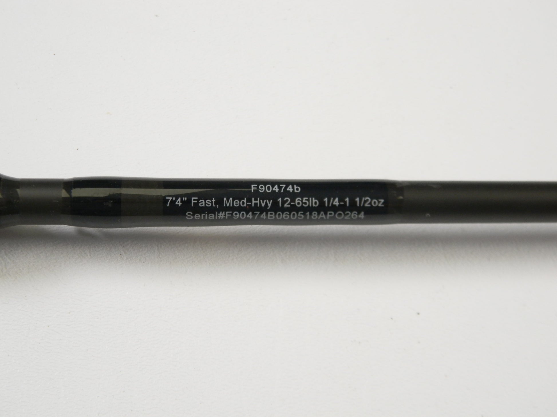 Close-up of the Cashion F90474b rod shows specs: 7'4" fast, med-hvy 12-65lb, 1/4-1 1/2oz; ideal for our Rod and Reel Trade-In program to refresh or trade used gear.