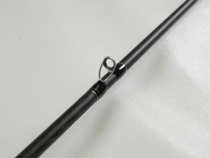 Close-up of a Phenix Maxim PHX-MAX-C610MH 6'10" Medium Heavy casting rod in excellent condition, showcasing the guide ring with black and green wraps. Perfect for our Rod and Reel Trade-In Program—exchange your used gear for store credit today.