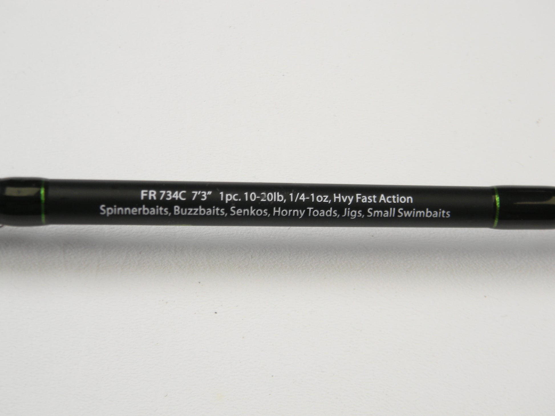 A close-up of the Dobyns Fury FR734C 7'3" Heavy in excellent condition. Perfect for spinnerbaits and jigs, its specs are 1pc, 10-20lb, 1/4-1oz, Hvy Fast Action. Upgrade using our Rod and Reel Trade-In Program to earn store credit toward new or used gear.