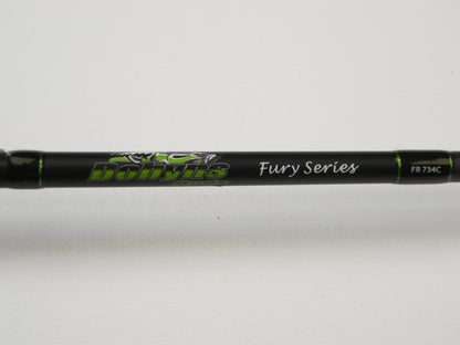 Close-up of a black Dobyns Fury FR734C Used Casting Rod with green accents, displaying the text "Dobyns Fury Series FR 734C" against a white background.