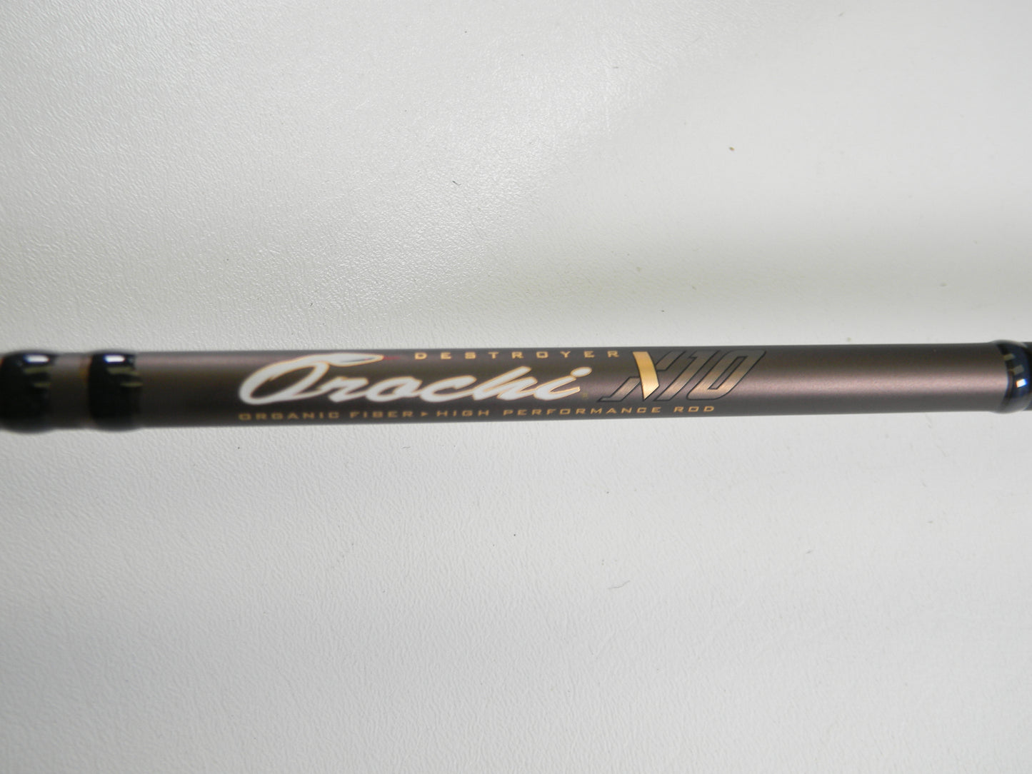 A close-up of a Megabass Orochi X10 F4-68XT Jabberwock 6'8" Medium Light Used Casting Rod in excellent condition—ideal for anglers using our Rod and Reel Trade-In Program to get store credit or upgrade to quality used gear.
