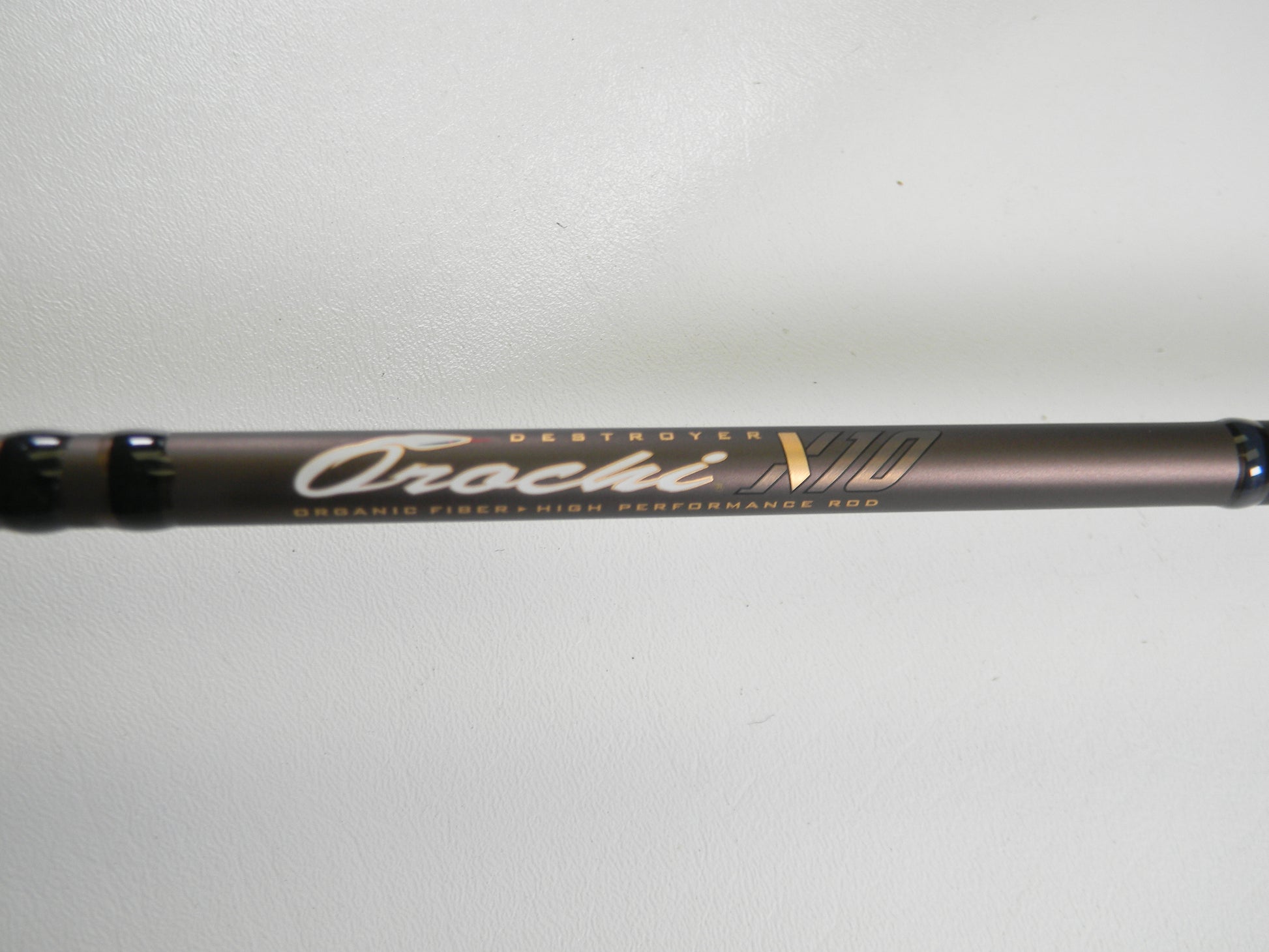 A close-up of a Megabass Orochi X10 F4-68XT Jabberwock 6'8" Medium Light Used Casting Rod in excellent condition—ideal for anglers using our Rod and Reel Trade-In Program to get store credit or upgrade to quality used gear.