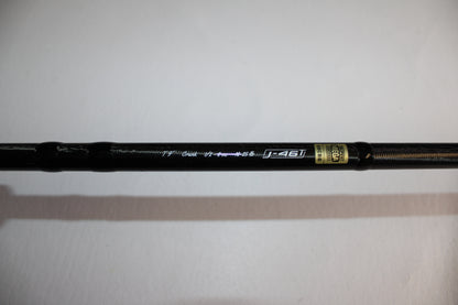 A close-up of a 13 Fishing Envy Black EB3C79C Crank casting rod in good used condition, featuring metallic "j-46T" text and a gold label on a white background.
