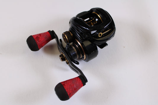 The Lew's Lite MgF LFS 7.5:1 RH Used Casting Reel (Good Condition), featuring red and black foam handle grips, is a great choice for those joining our Rod and Reel Trade-In Program to earn store credit on used gear.