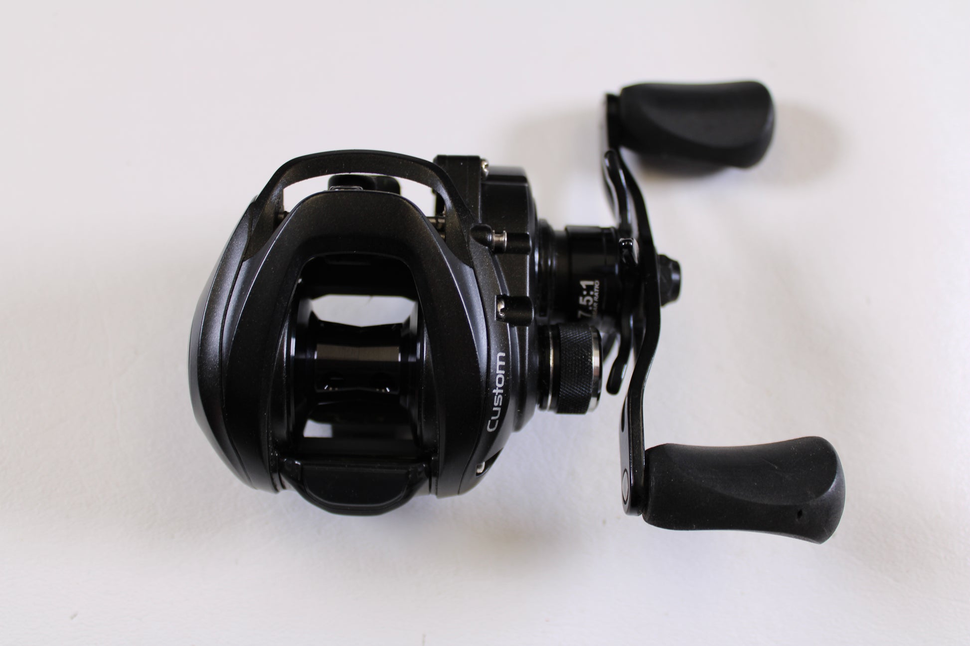 Upgrade with our Rod and Reel Trade-In Program or buy quality used gear like the Lew's Custom Speed Spool SLP CU1SH 7.5:1 RH—an excellent condition casting reel with ergonomic handles and visible spool, perfect for your next fishing trip.