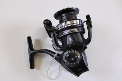 An Abu Garcia Elite Max 30 6.2:1 used spinning reel in excellent condition with silver accents is displayed on a white surface—perfect for trading in your old gear through our Rod and Reel Trade-In Program.