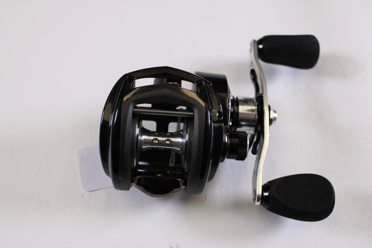 A close-up of the Abu Garcia Revo Winch Gen 2 5.4:1 RH Used Casting Reel in excellent condition—ideal for upgrading through our Rod and Reel Trade-In Program or shopping quality used Abu Garcia gear.